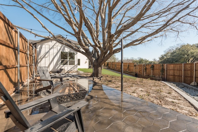 view of patio with a fenced backyard