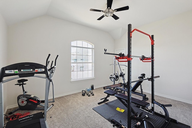 workout room featuring ceiling fan, baseboards, vaulted ceiling, and carpet flooring