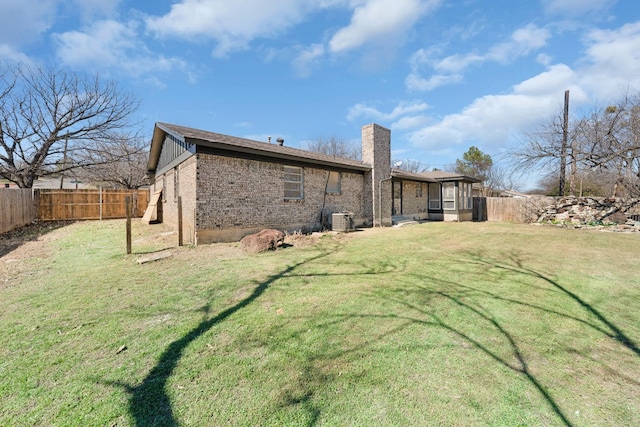 view of yard featuring cooling unit and a fenced backyard