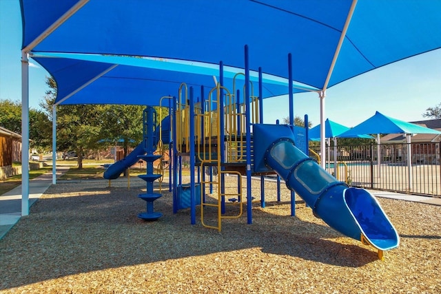 community playground featuring fence