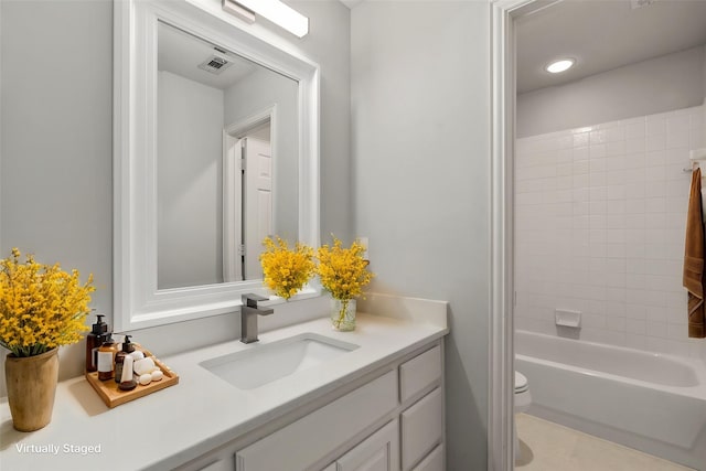 full bath with visible vents, shower / bathing tub combination, vanity, and toilet