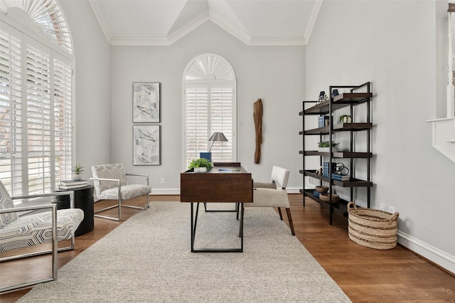 home office with baseboards, ornamental molding, and wood finished floors