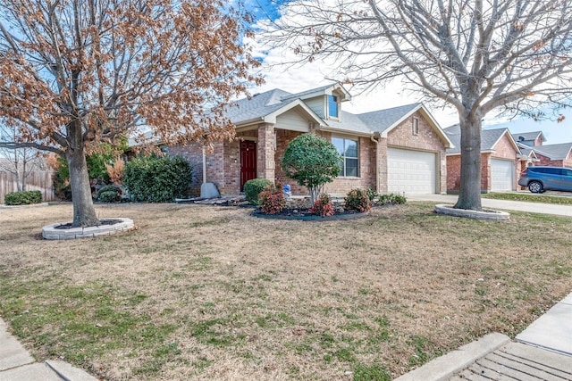 view of front of house with a garage, brick siding, concrete driveway, and a front lawn