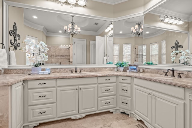 bathroom featuring a sink, crown molding, a walk in shower, and a notable chandelier