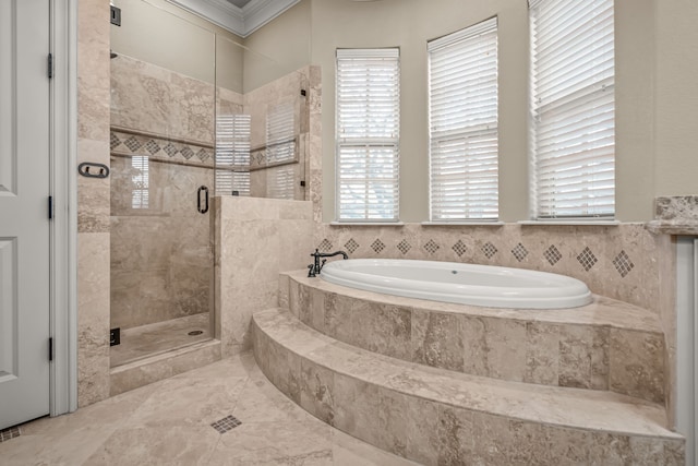 bathroom with a stall shower and a bath