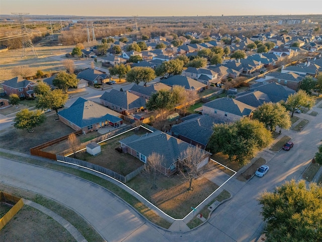 aerial view at dusk with a residential view