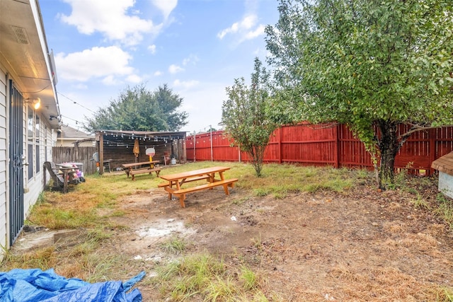 view of yard featuring a fenced backyard