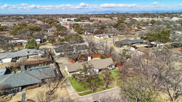 birds eye view of property featuring a mountain view and a residential view