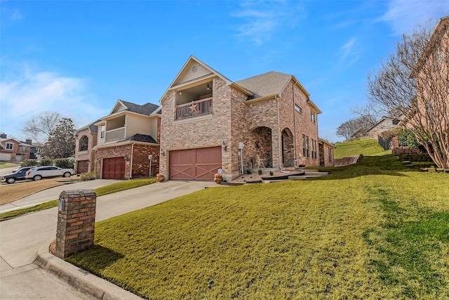 view of front facade with a balcony, a garage, brick siding, concrete driveway, and a front lawn