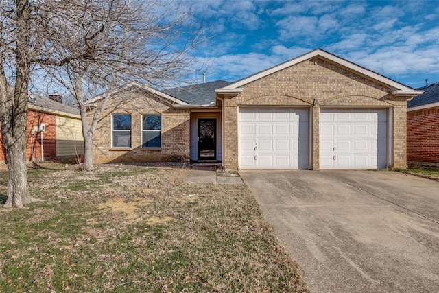 ranch-style house featuring an attached garage, roof with shingles, concrete driveway, and brick siding