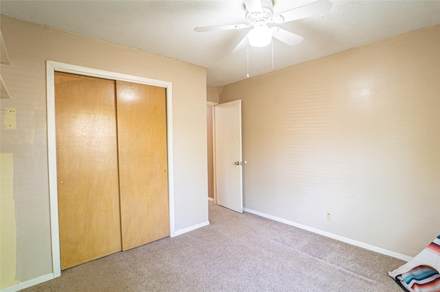 3813 Concord Dr, Abilene, TX 79603 - unfurnished bedroom featuring carpet, a closet, and a ceiling fan