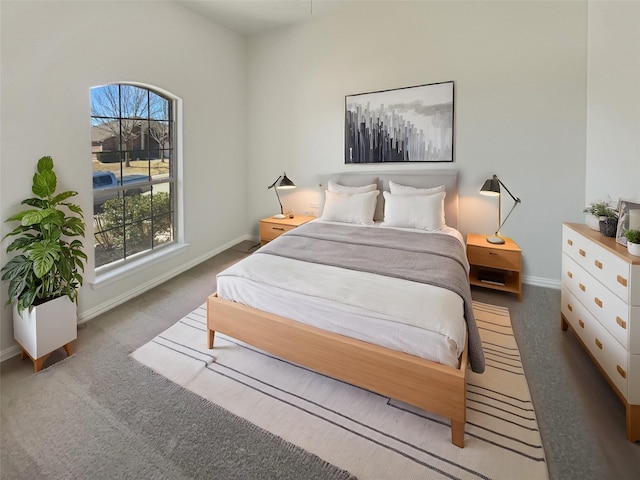 carpeted bedroom with baseboards