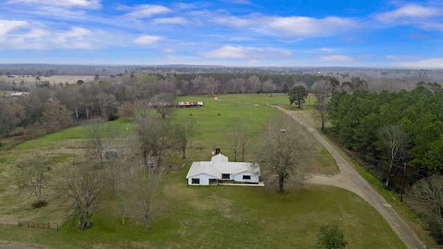 birds eye view of property featuring a rural view