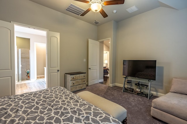 bedroom with ceiling fan, dark carpet, visible vents, and baseboards