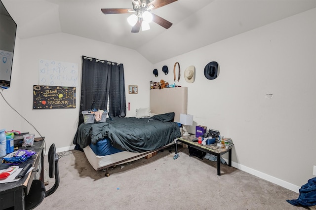 bedroom with lofted ceiling, light carpet, baseboards, and a ceiling fan