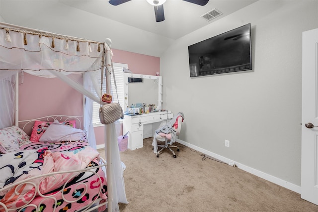 bedroom featuring visible vents, light carpet, and baseboards