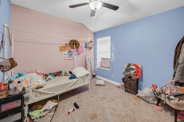 carpeted bedroom featuring a ceiling fan, lofted ceiling, and baseboards