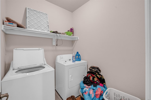 laundry area featuring laundry area and washing machine and dryer