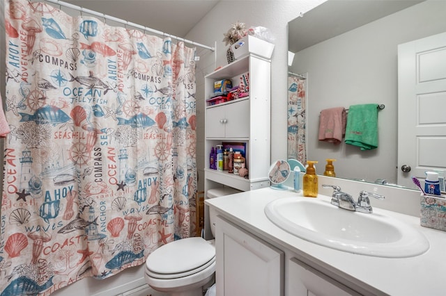 full bathroom featuring shower / bathtub combination with curtain, vanity, and toilet