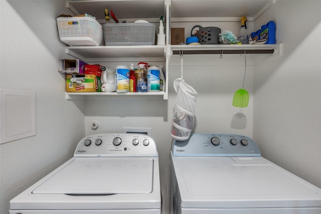 laundry room featuring washer and dryer and laundry area