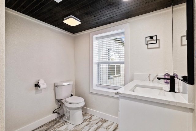 half bathroom featuring marble finish floor, toilet, wood ceiling, vanity, and baseboards