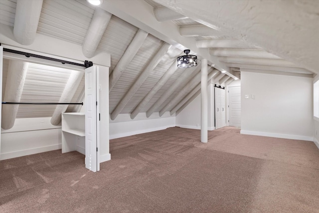 additional living space with lofted ceiling with beams, carpet floors, and baseboards