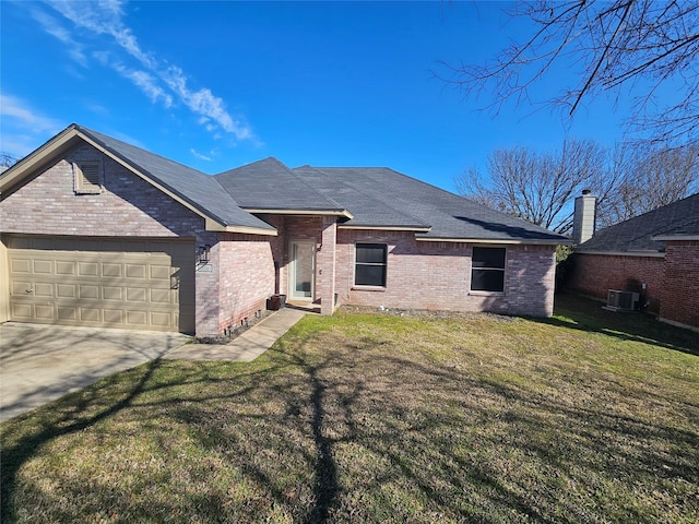 ranch-style house featuring entry steps, brick siding, and a front lawn