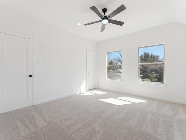 unfurnished room with recessed lighting, ceiling fan, and light colored carpet