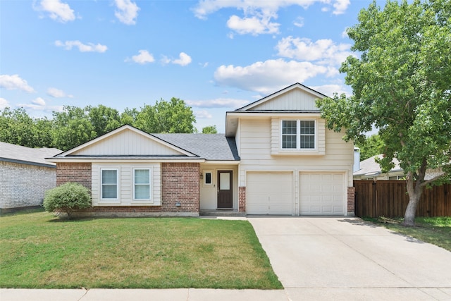 view of front of home featuring brick siding, an attached garage, fence, driveway, and a front lawn