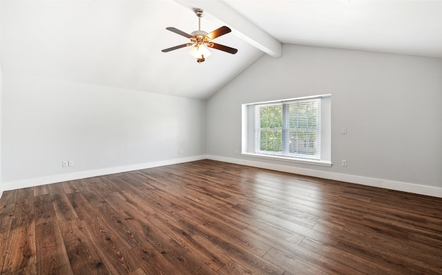 empty room featuring vaulted ceiling with beams, dark wood-style flooring, a ceiling fan, and baseboards