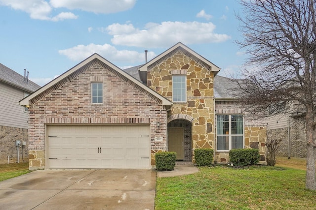 traditional-style house featuring an attached garage, brick siding, driveway, stone siding, and a front lawn