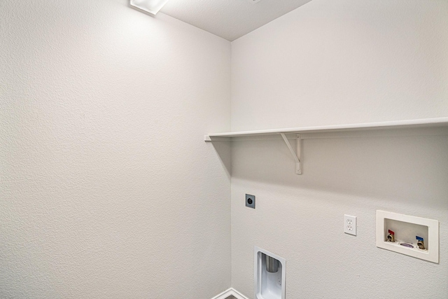 clothes washing area with laundry area, hookup for a washing machine, and electric dryer hookup