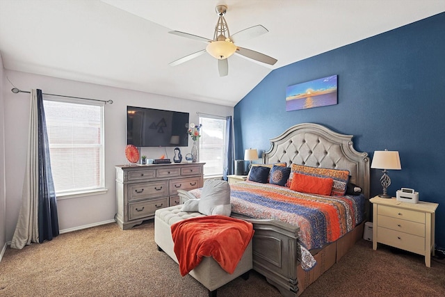 carpeted bedroom featuring lofted ceiling, a ceiling fan, and baseboards