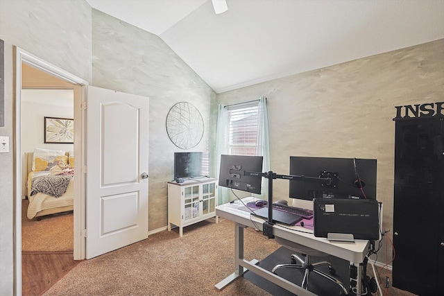 carpeted office with vaulted ceiling