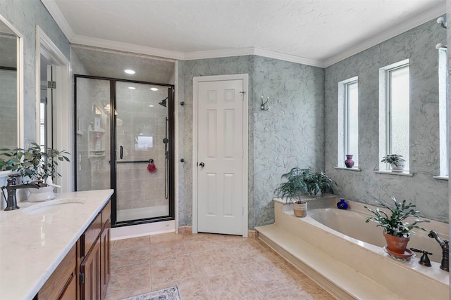 full bathroom featuring vanity, a stall shower, ornamental molding, tile patterned flooring, and a bath