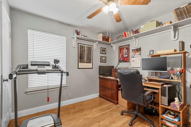 home office with wood finished floors, baseboards, and ceiling fan