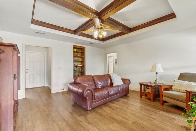 living room featuring light wood-type flooring, visible vents, beamed ceiling, coffered ceiling, and baseboards