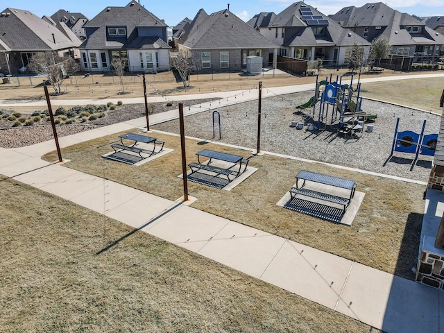 surrounding community featuring playground community and a residential view