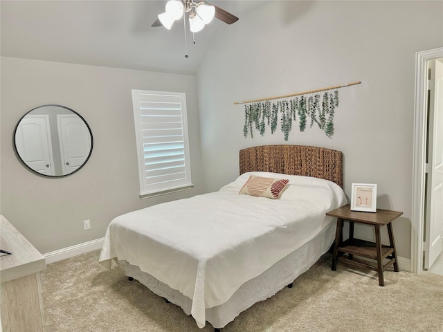 bedroom featuring light carpet, ceiling fan, lofted ceiling, and baseboards