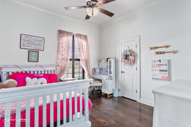 bedroom featuring crown molding, wood finished floors, baseboards, and ceiling fan