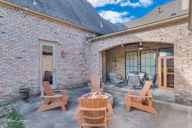 view of patio / terrace featuring a fire pit