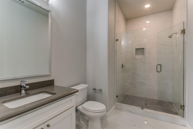 full bathroom featuring toilet, vanity, baseboards, marble finish floor, and a shower stall