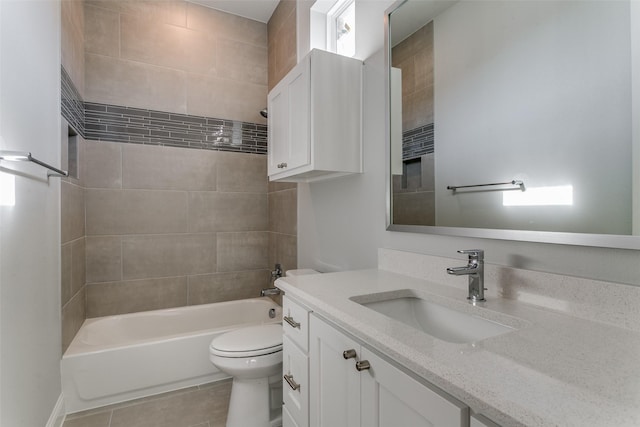 bathroom with toilet, tile patterned flooring, tub / shower combination, and vanity