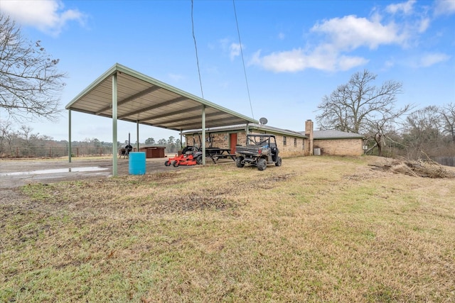 exterior space with a detached carport