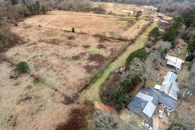 birds eye view of property featuring a rural view