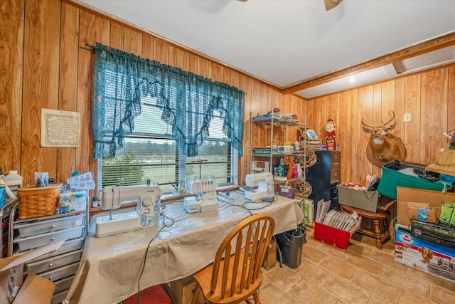 dining area with wooden walls