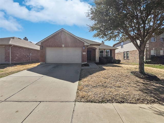 single story home featuring a garage, driveway, brick siding, and a chimney