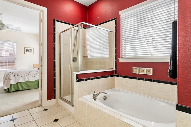 ensuite bathroom with tile patterned floors, a ceiling fan, connected bathroom, a shower stall, and a bath