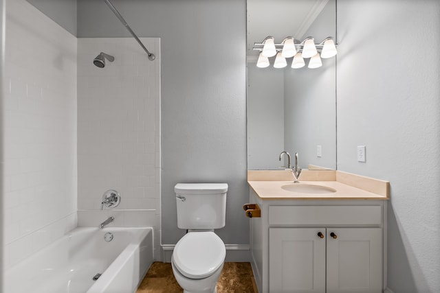 full bathroom featuring shower / bathing tub combination, vanity, toilet, and baseboards