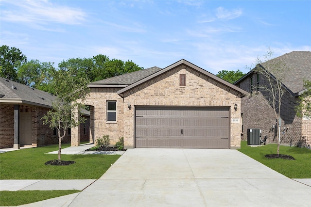 1810 Iris Rd, Melissa, TX 75454 - french provincial home featuring an attached garage, driveway, a front lawn, brick siding, and central AC unit